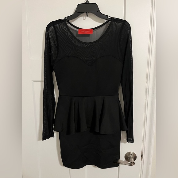 Black peplum mini dress with sheer sleeves. Perfect NYE dress! - Picture 1 of 2